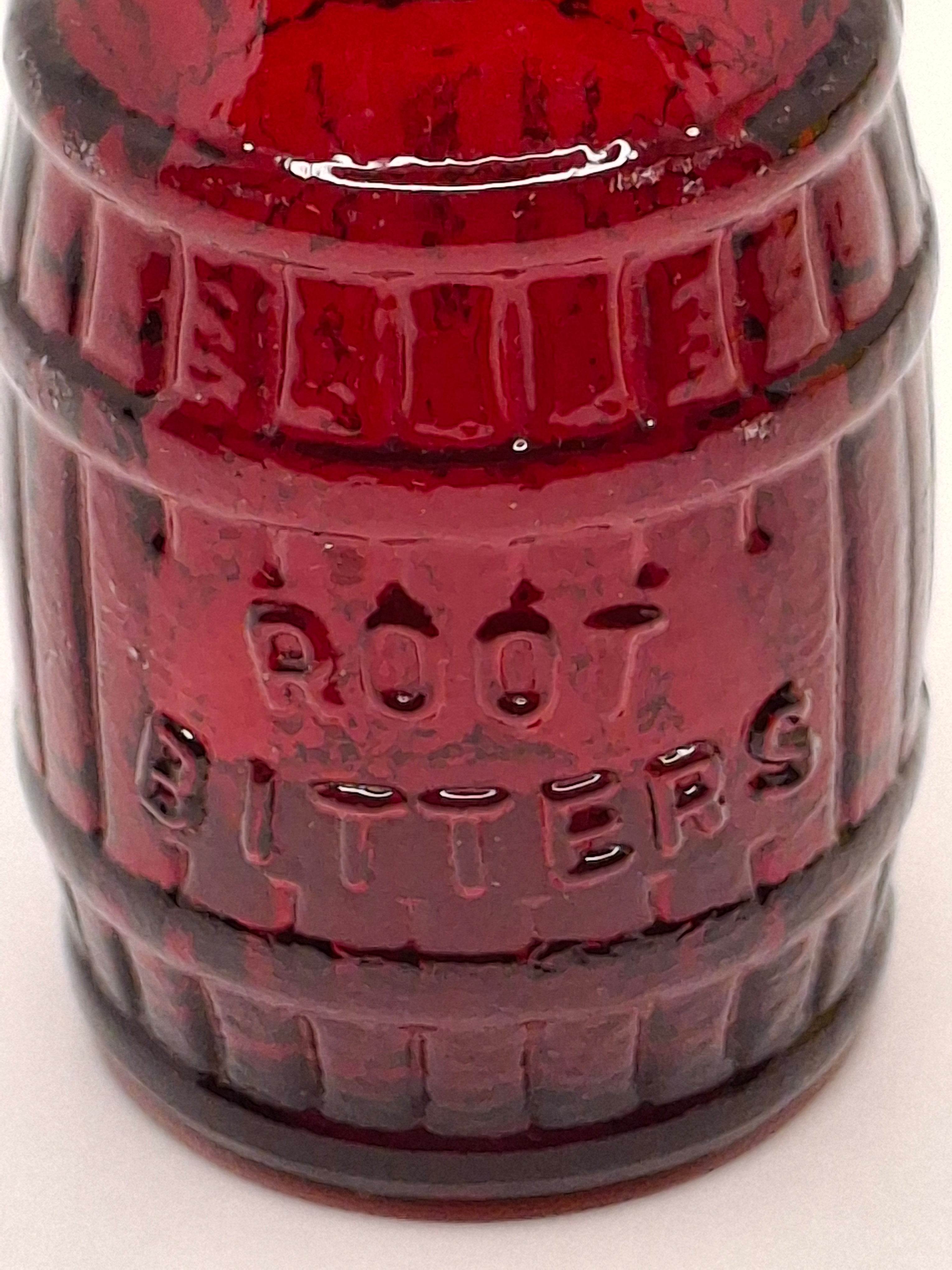 Pair of 1970s Vintage Mini Bottles - Red "Root Bitters" & Green "Old Doc's" Corn