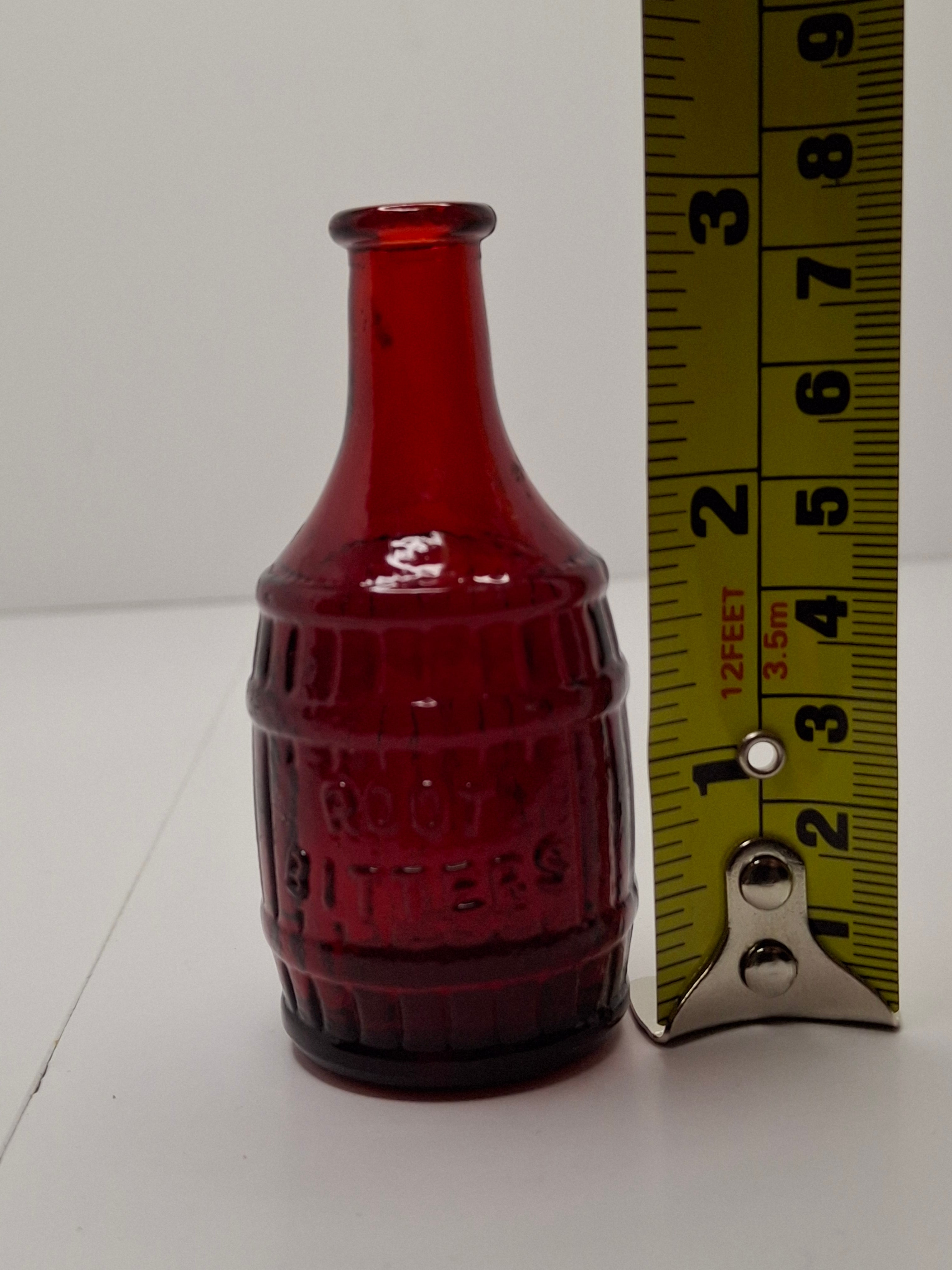 Pair of 1970s Vintage Mini Bottles - Red "Root Bitters" & Green "Old Doc's" Corn