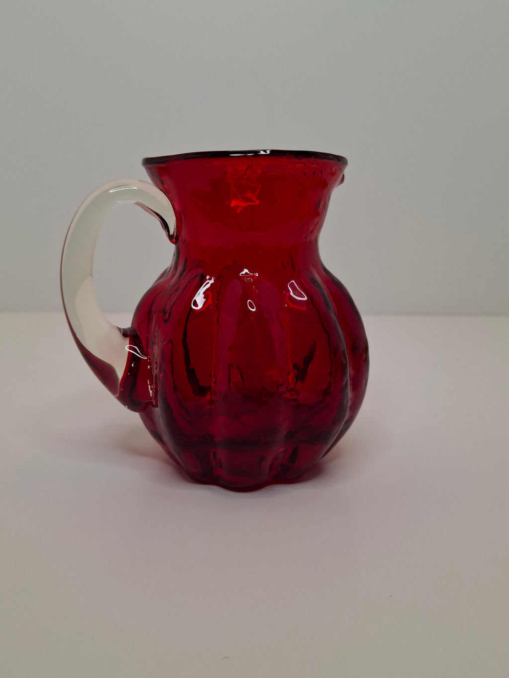 Circa late 1800s to 1940s Hand-Blown Ruby Red Cranberry Glass Creamer w/ Clear Applied Handle & Pontil