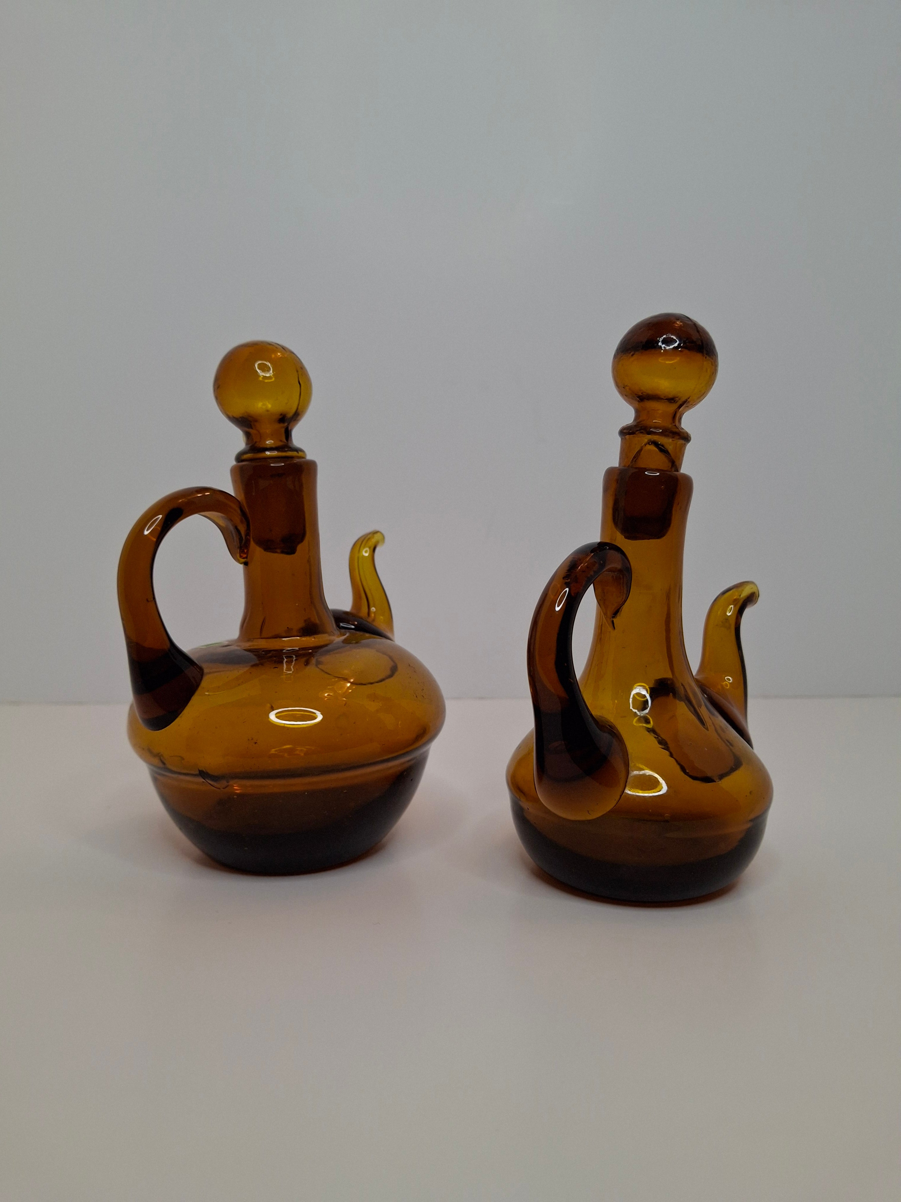Pair of Hand-Blown Amber Glass Cruets w/ Stoppers, Applied Handle/Spouts Spain