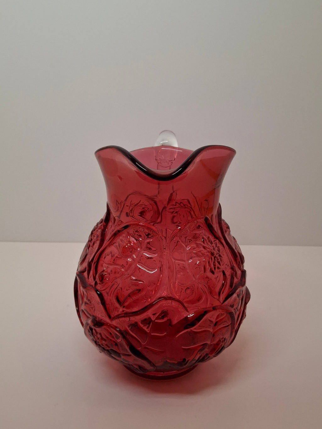 Large Vintage Fenton Cranberry Glass Pitcher with Raised Roses & Applied Clear Handle