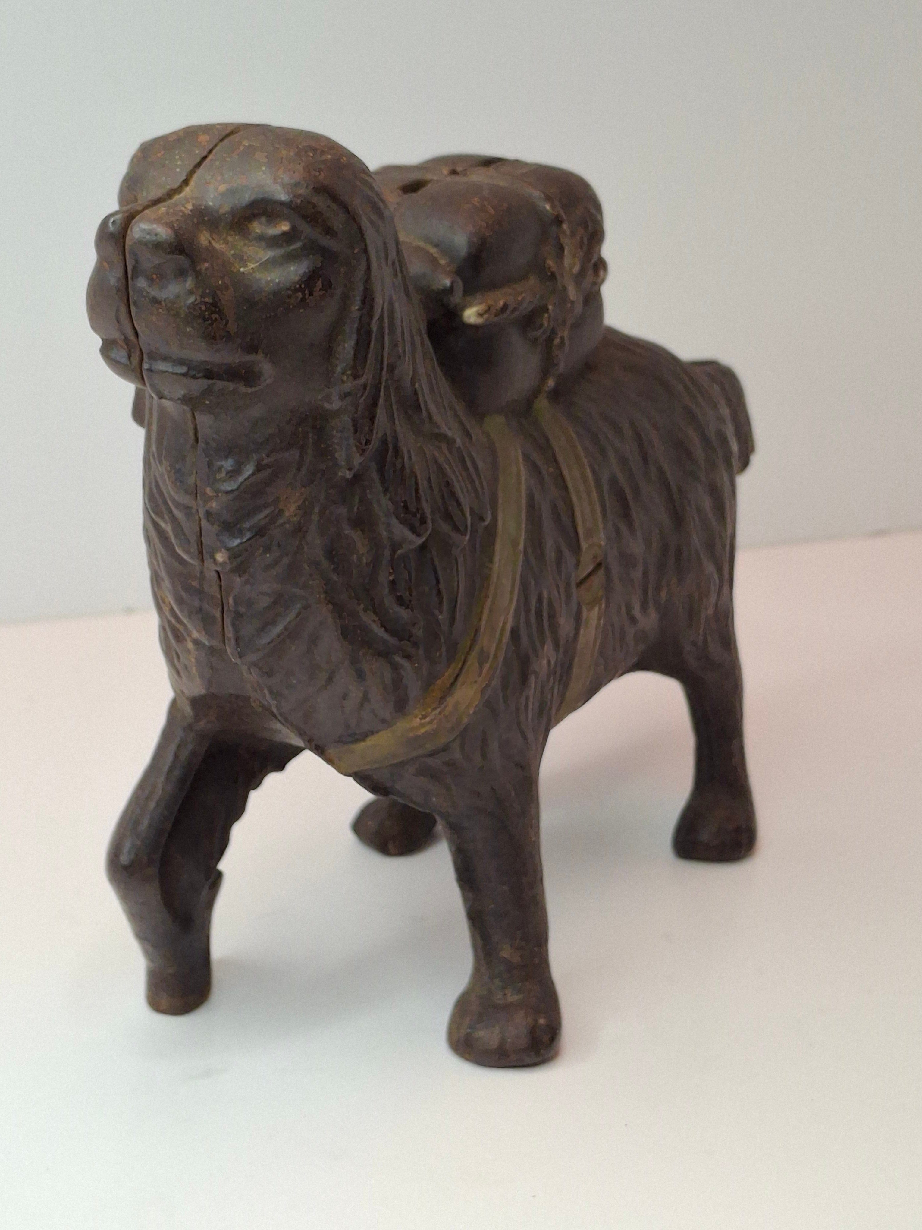 Antique A.C. Williams Cast Iron St. Bernard Dog with Pack Still Bank c. 1910