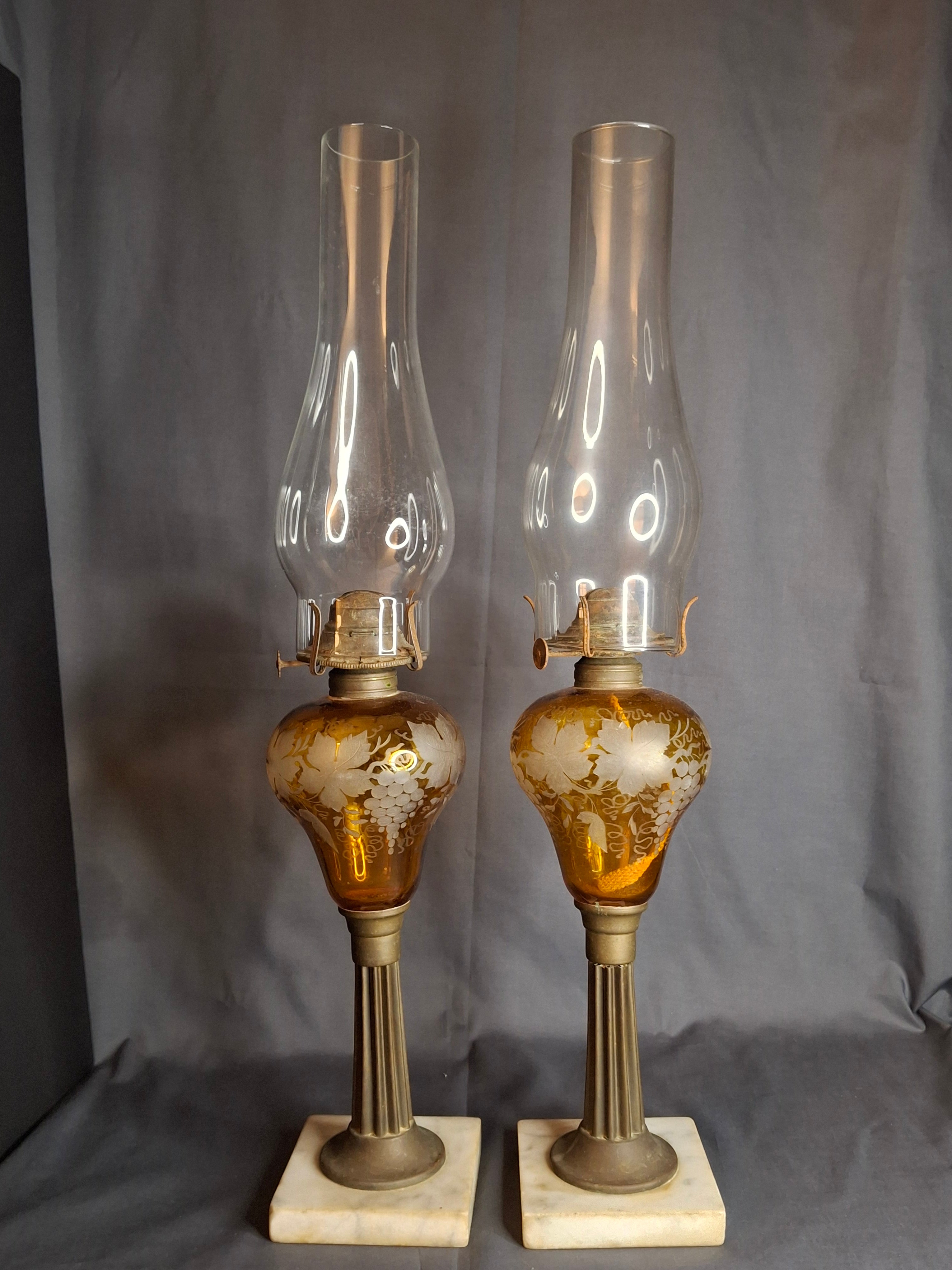 Antique Matching Pair 19th Century Amber Glass Kerosene Lamps Grape Pattern Marble Base