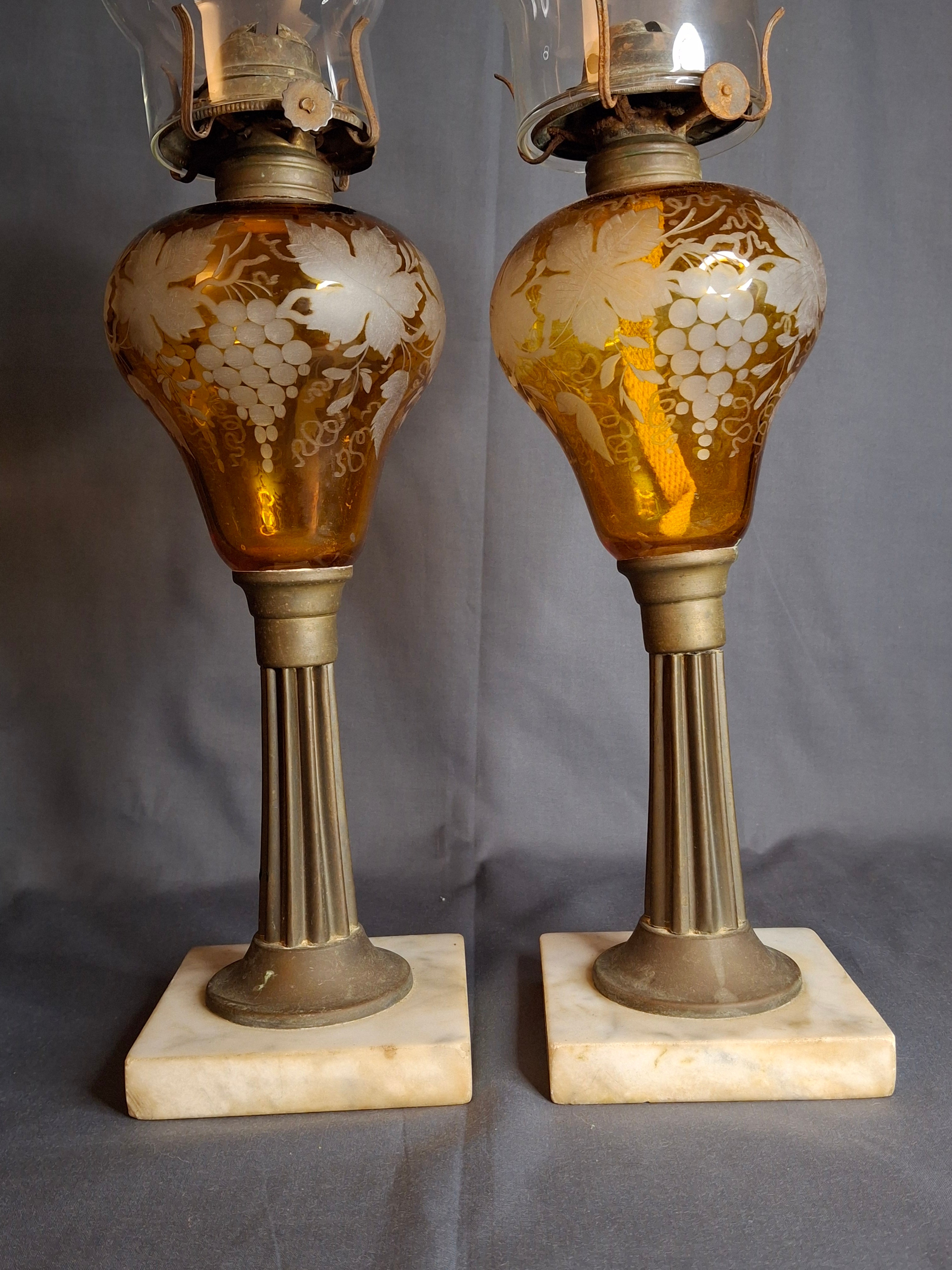 Antique Matching Pair 19th Century Amber Glass Kerosene Lamps Grape Pattern Marble Base