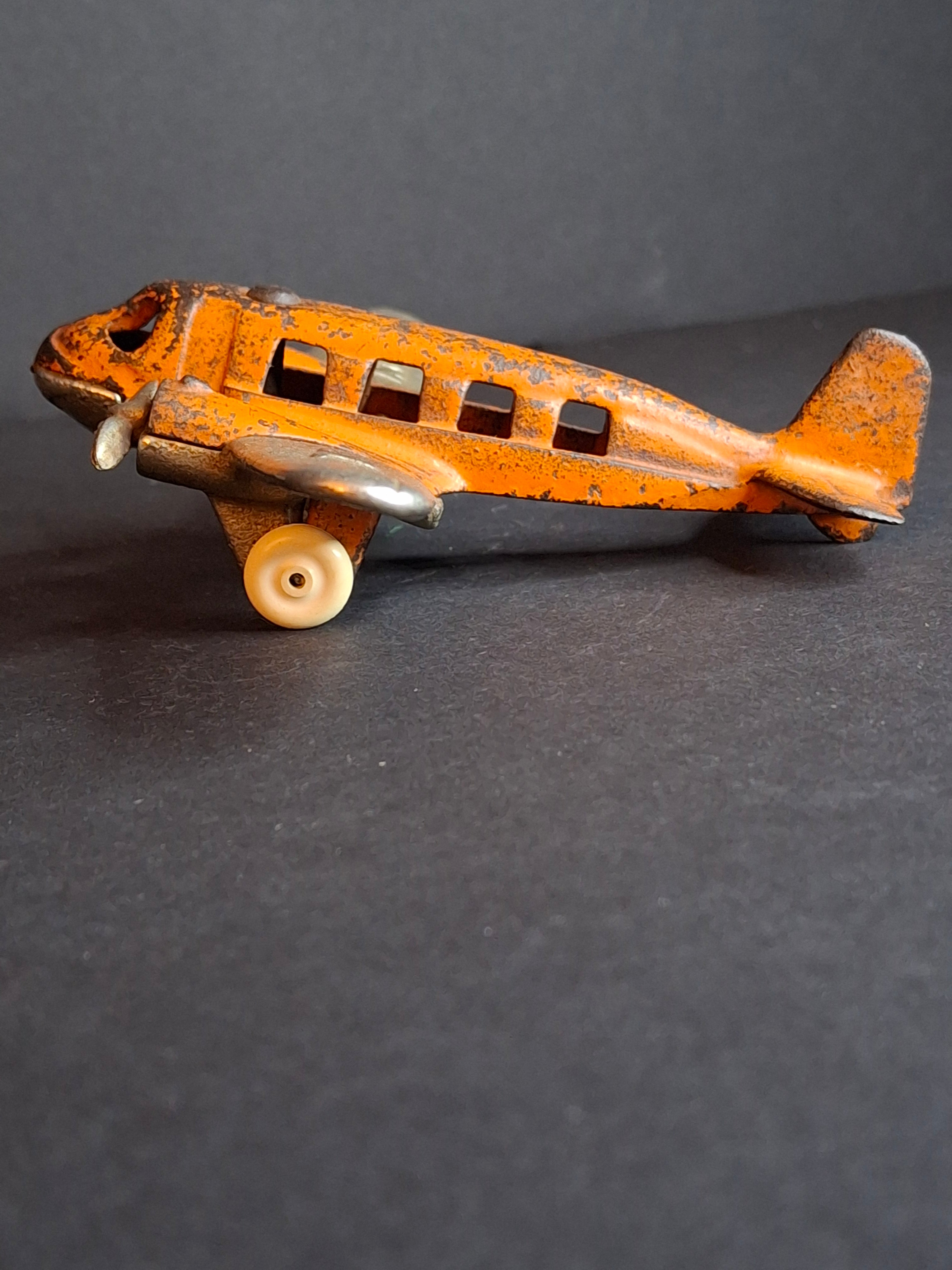 Vintage 1930s Hubley Cast Iron TAT NC-491 Dual Prop Airplane Toy Orange Nickel