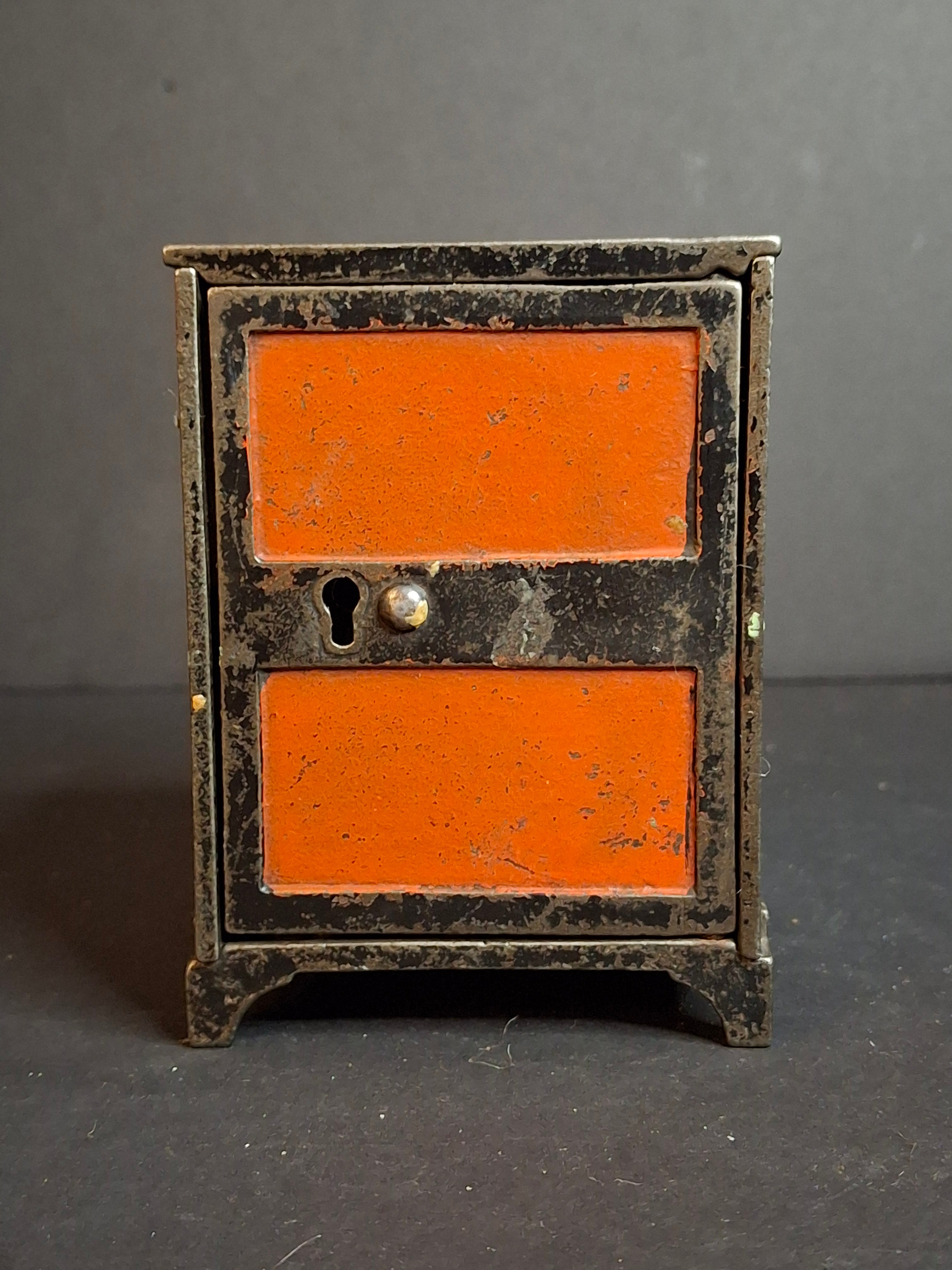 Antique 1880s Cast Iron Two Panel Door Safe Penny Bank – Bright Orange & Black Japanned Finish – Large Variant – The Peirce Collection Provenance