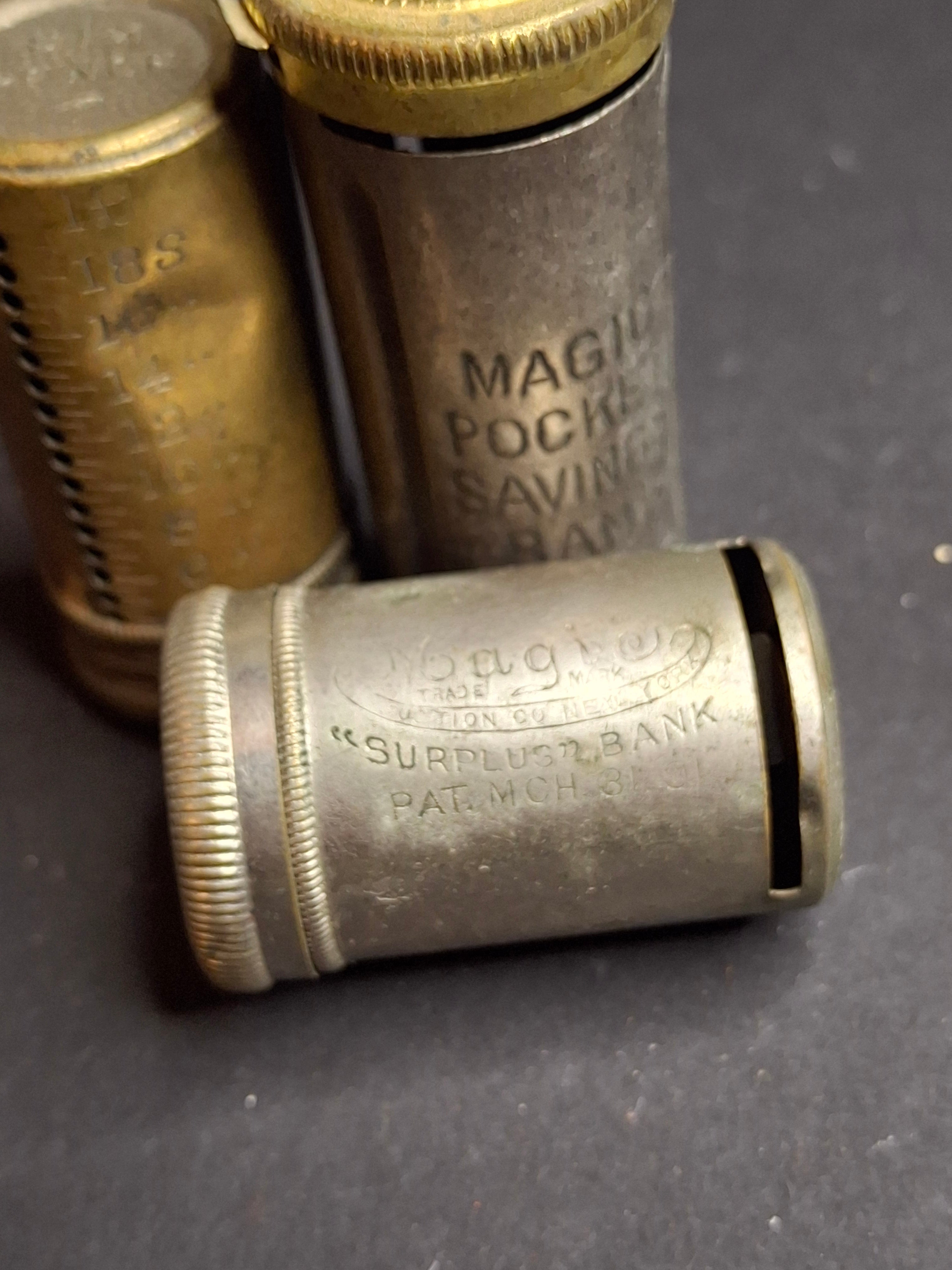Lot of 3 Antique Magic Pocket Banks 1890-1950s Surplus Six Pence Coin Counters