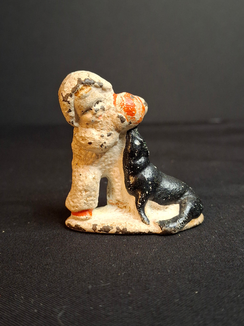 Antique Cast Iron Snow Baby with Seal Paperweight Figurine Vintage 1920s