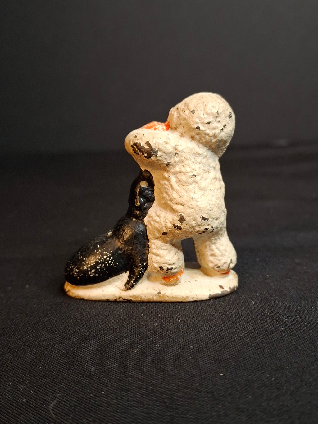 Antique Cast Iron Snow Baby with Seal Paperweight Figurine Vintage 1920s