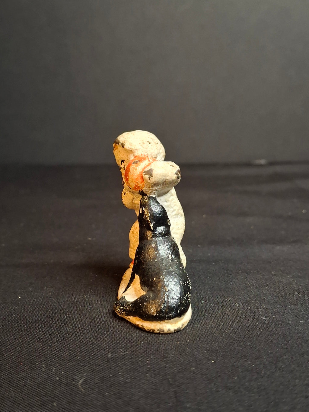 Antique Cast Iron Snow Baby with Seal Paperweight Figurine Vintage 1920s