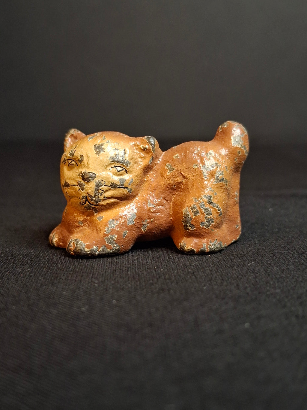 Antique Cast Iron Miniature Reclining Cat Figurine Paperweight Painted Tan 1.5”