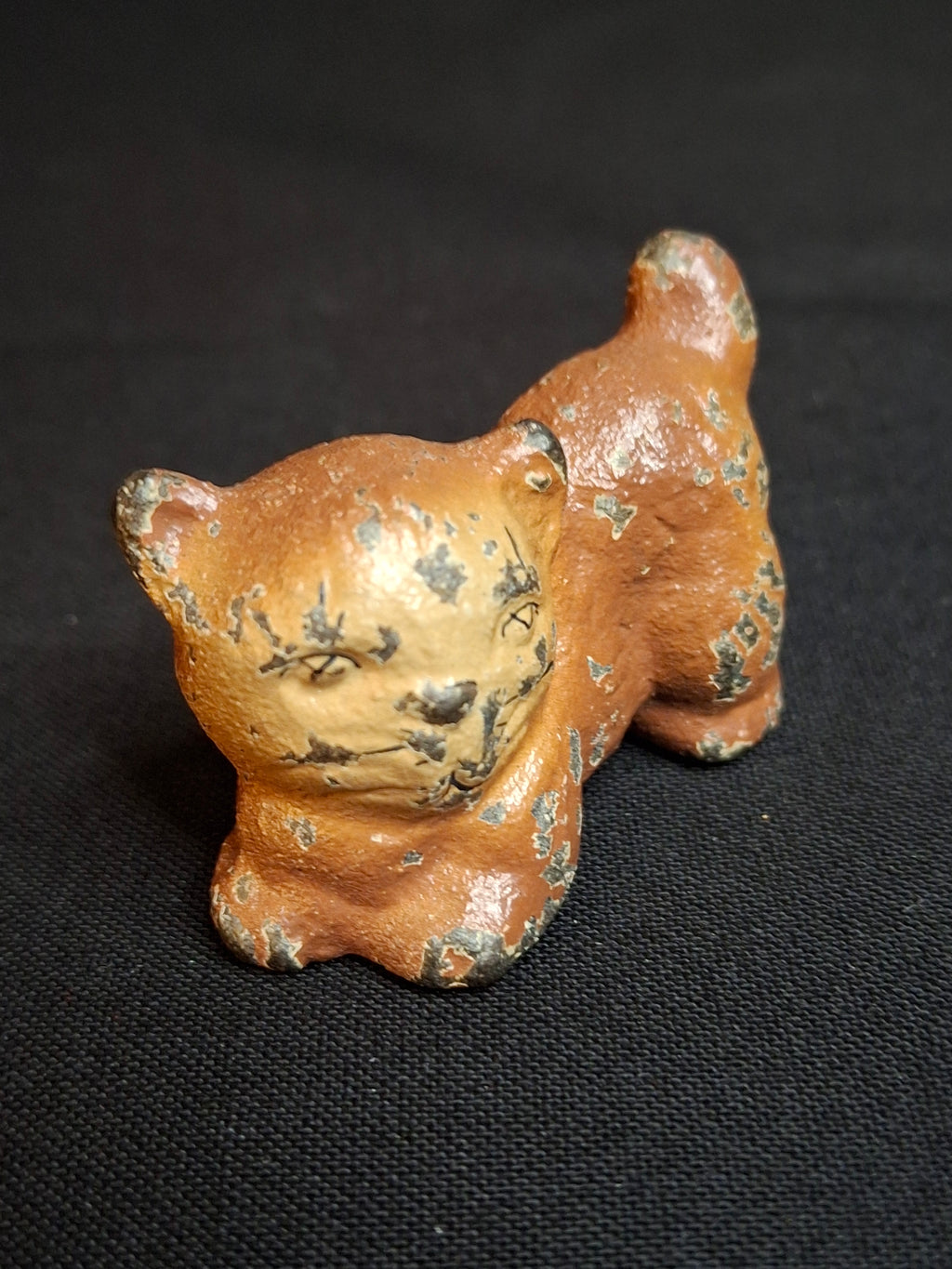 Antique Cast Iron Miniature Reclining Cat Figurine Paperweight Painted Tan 1.5”