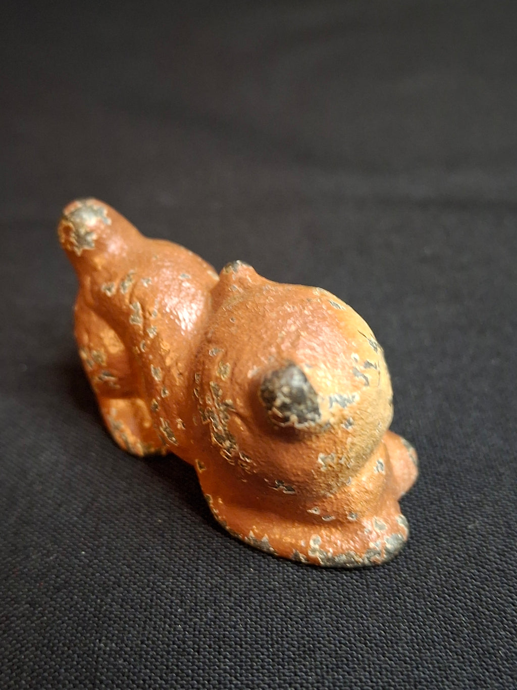 Antique Cast Iron Miniature Reclining Cat Figurine Paperweight Painted Tan 1.5”