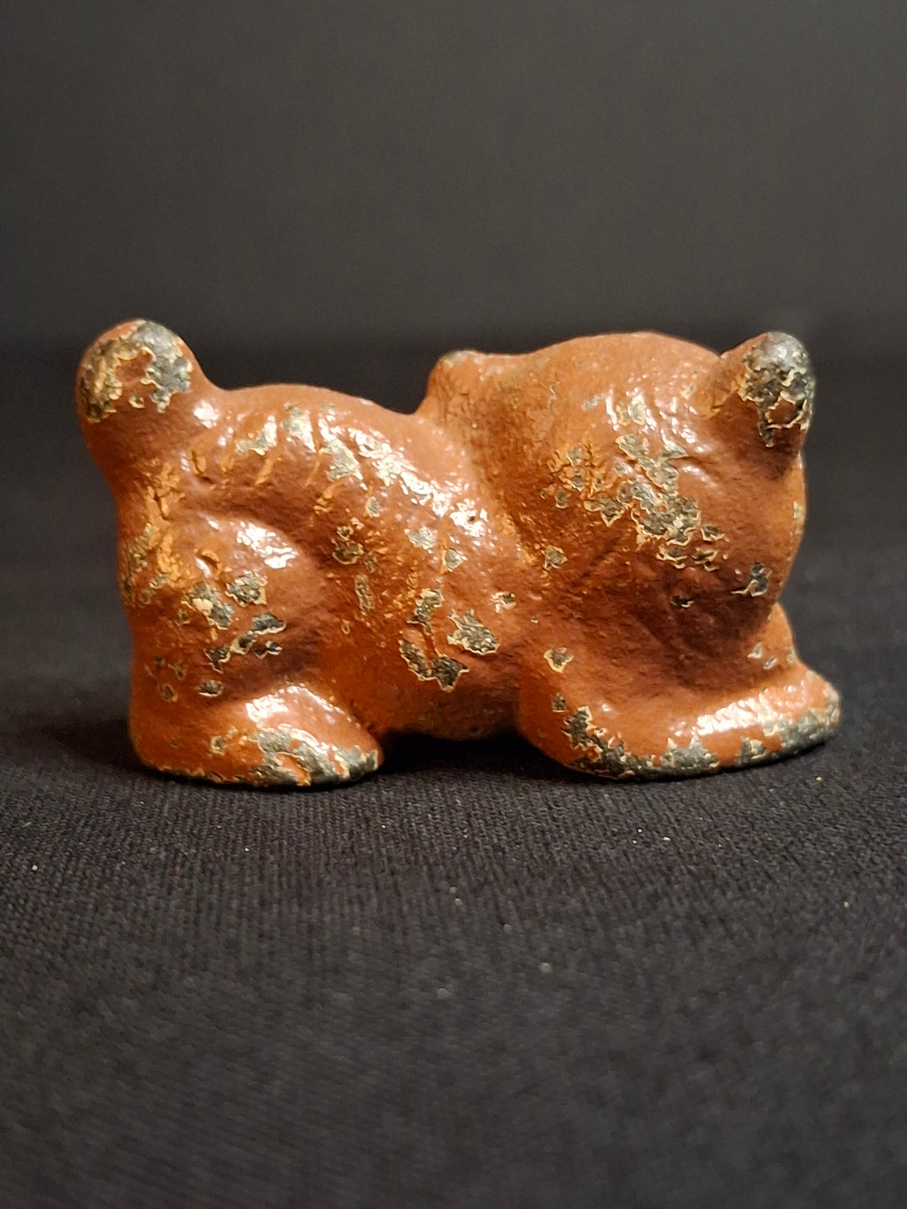 Antique Cast Iron Miniature Reclining Cat Figurine Paperweight Painted Tan 1.5”