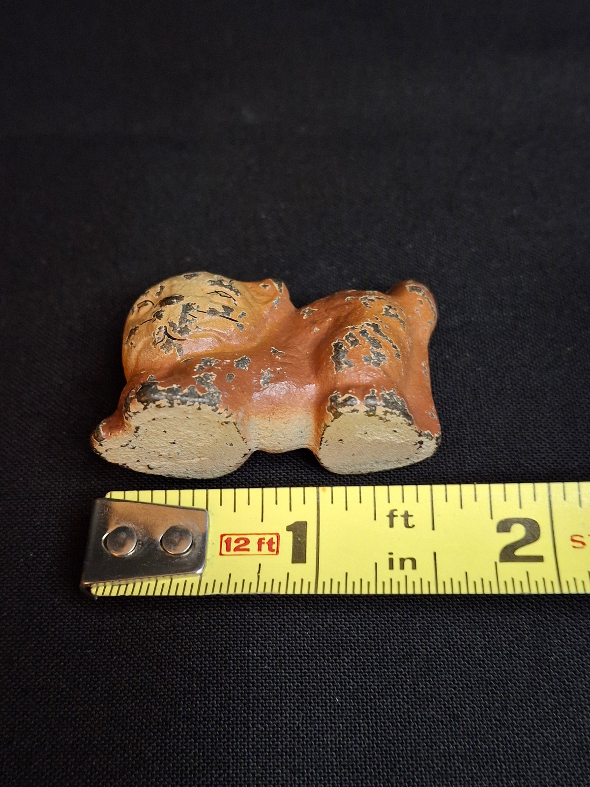 Antique Cast Iron Miniature Reclining Cat Figurine Paperweight Painted Tan 1.5”