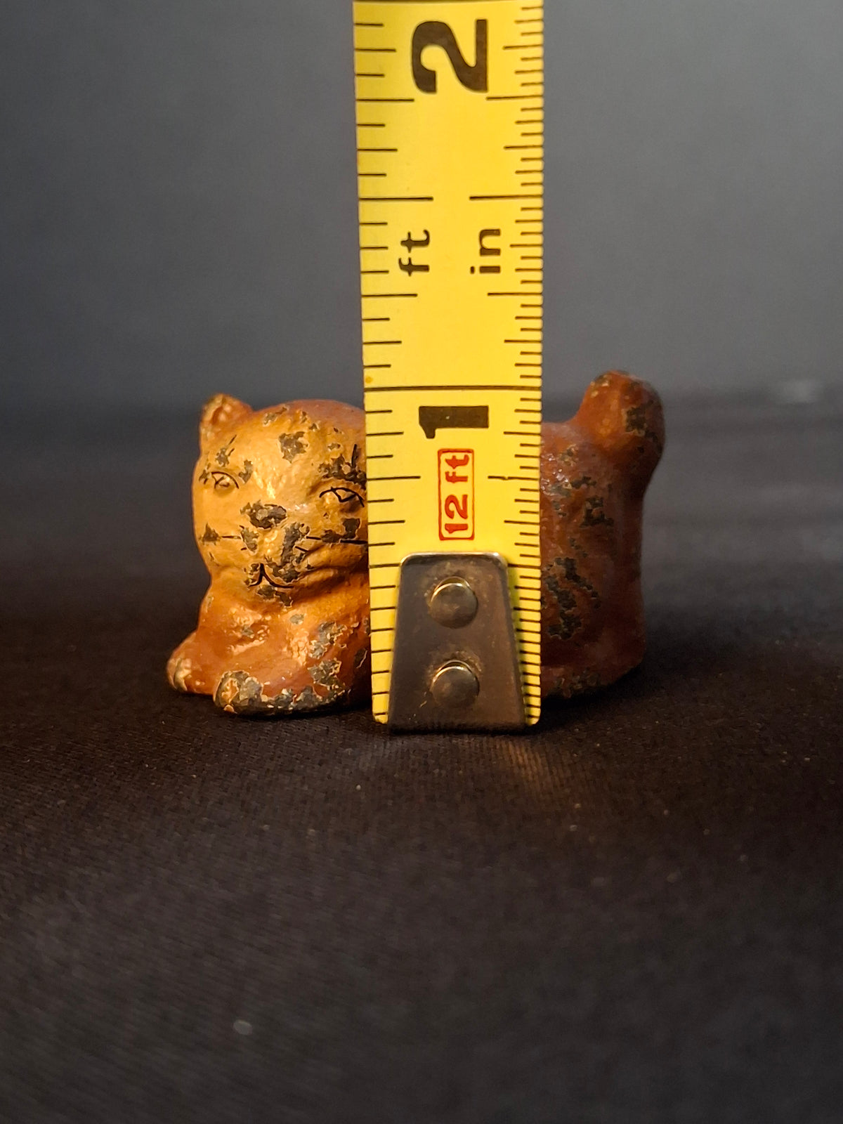 Antique Cast Iron Miniature Reclining Cat Figurine Paperweight Painted Tan 1.5”