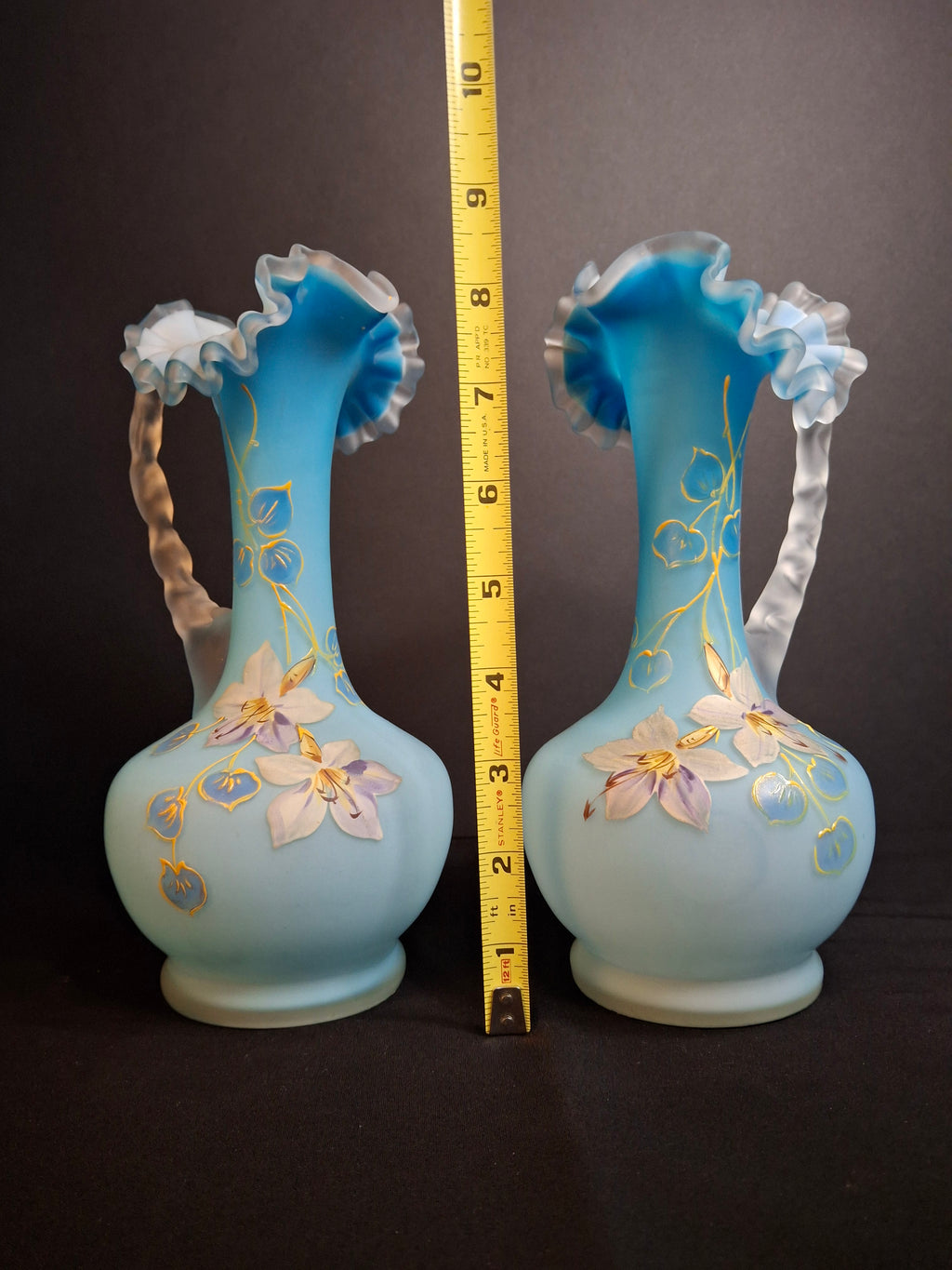 Antique Pair Victorian Blue Satin Cased Glass Pitcher Ewers Hand Painted Orchids Frosted Coral Branch Handles Ruffled Rim