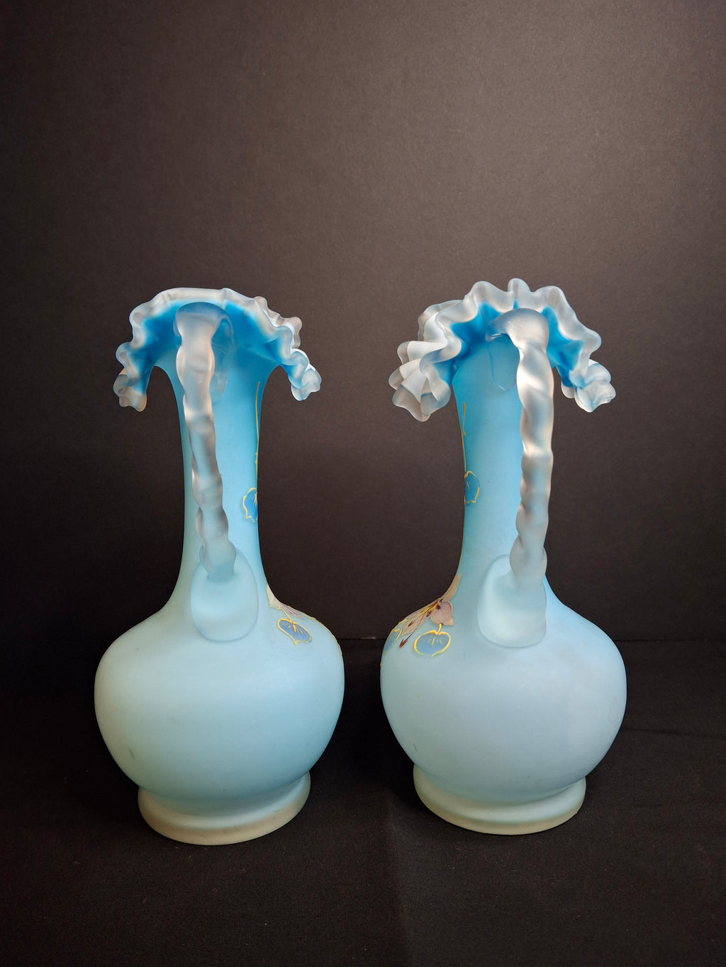 Antique Pair Victorian Blue Satin Cased Glass Pitcher Ewers Hand Painted Orchids Frosted Coral Branch Handles Ruffled Rim