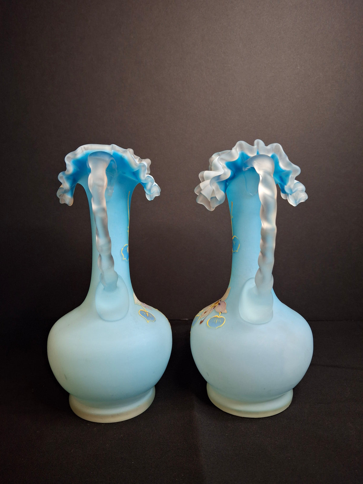 Antique Pair Victorian Blue Satin Cased Glass Pitcher Ewers Hand Painted Orchids Frosted Coral Branch Handles Ruffled Rim