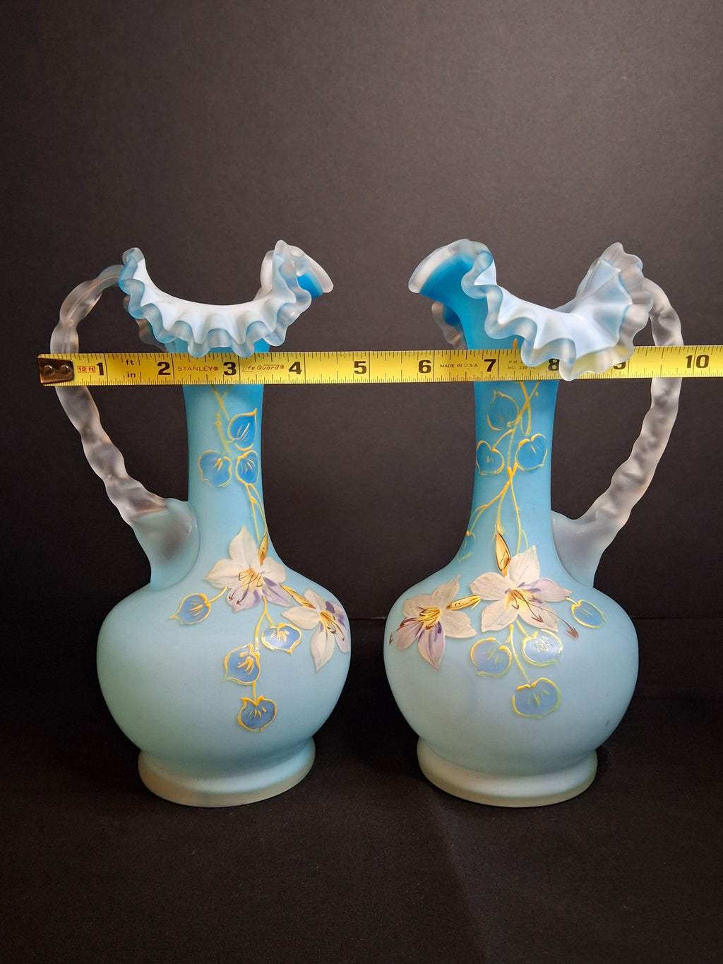 Antique Pair Victorian Blue Satin Cased Glass Pitcher Ewers Hand Painted Orchids Frosted Coral Branch Handles Ruffled Rim