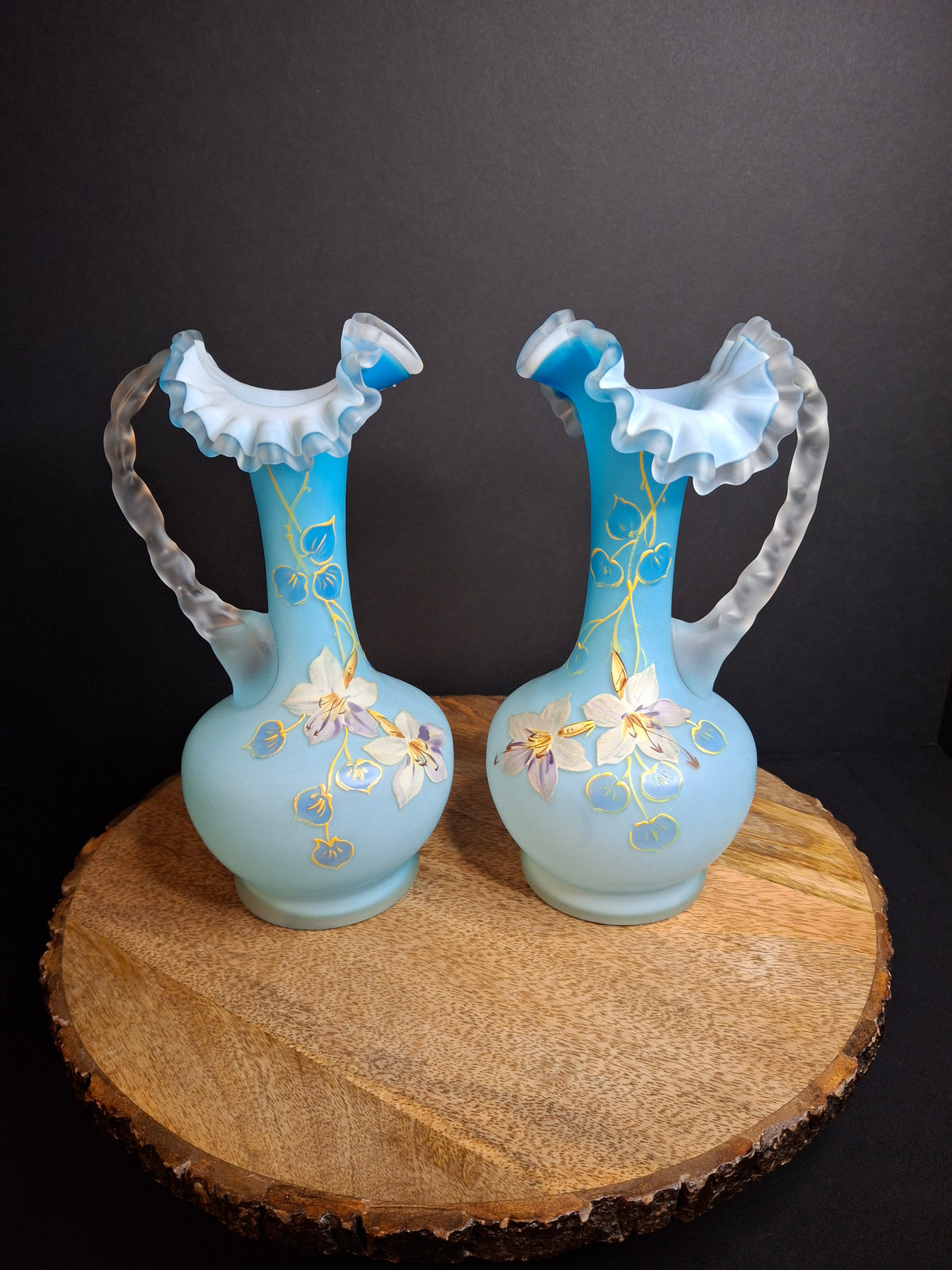 Antique Pair Victorian Blue Satin Cased Glass Pitcher Ewers Hand Painted Orchids Frosted Coral Branch Handles Ruffled Rim