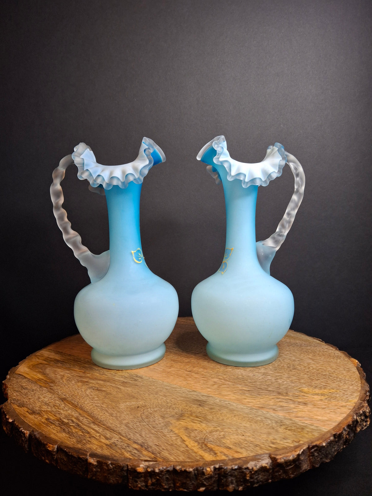 Antique Pair Victorian Blue Satin Cased Glass Pitcher Ewers Hand Painted Orchids Frosted Coral Branch Handles Ruffled Rim