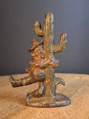 Vintage Cast Iron Drunk Cowboy Hugging Cactus Figural Bottle Opener Figure