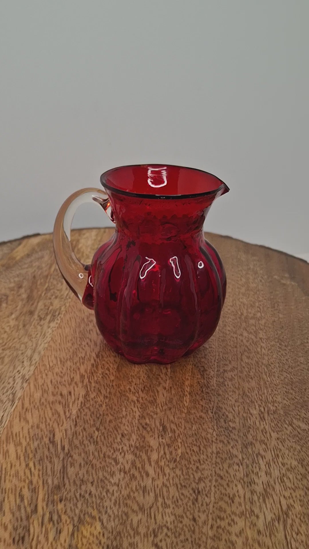 Circa late 1800s to 1940s Hand-Blown Ruby Red Cranberry Glass Creamer w/ Clear Applied Handle & Pontil